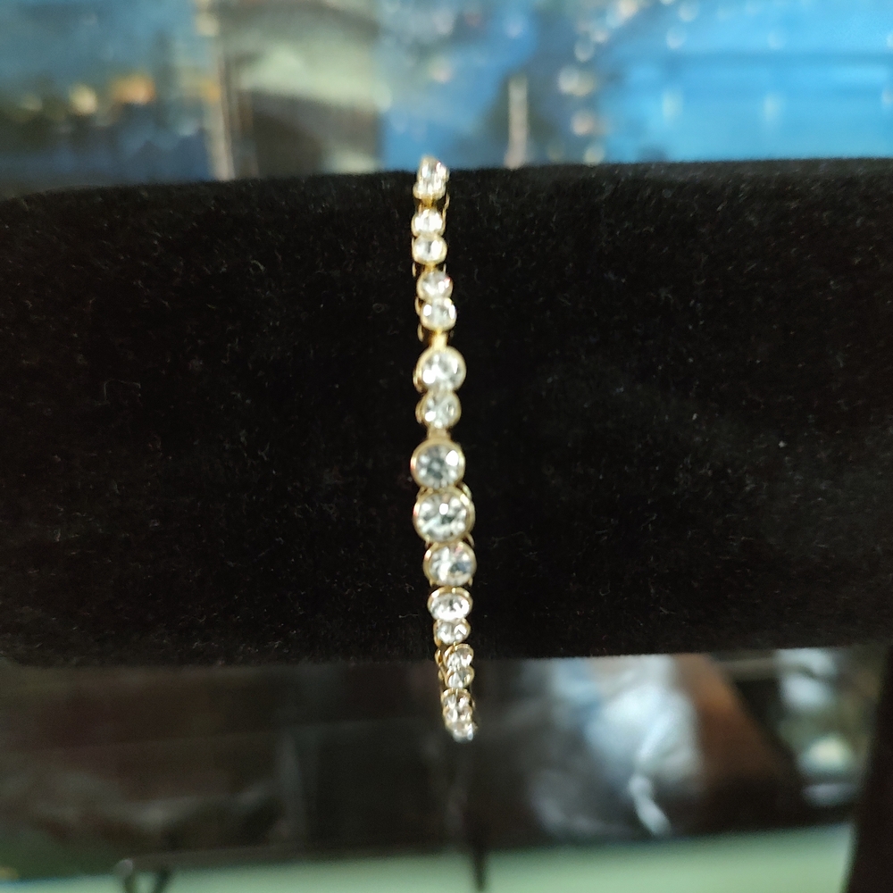 BaubleBar Gold and Silver Bracelet with Elegant Design